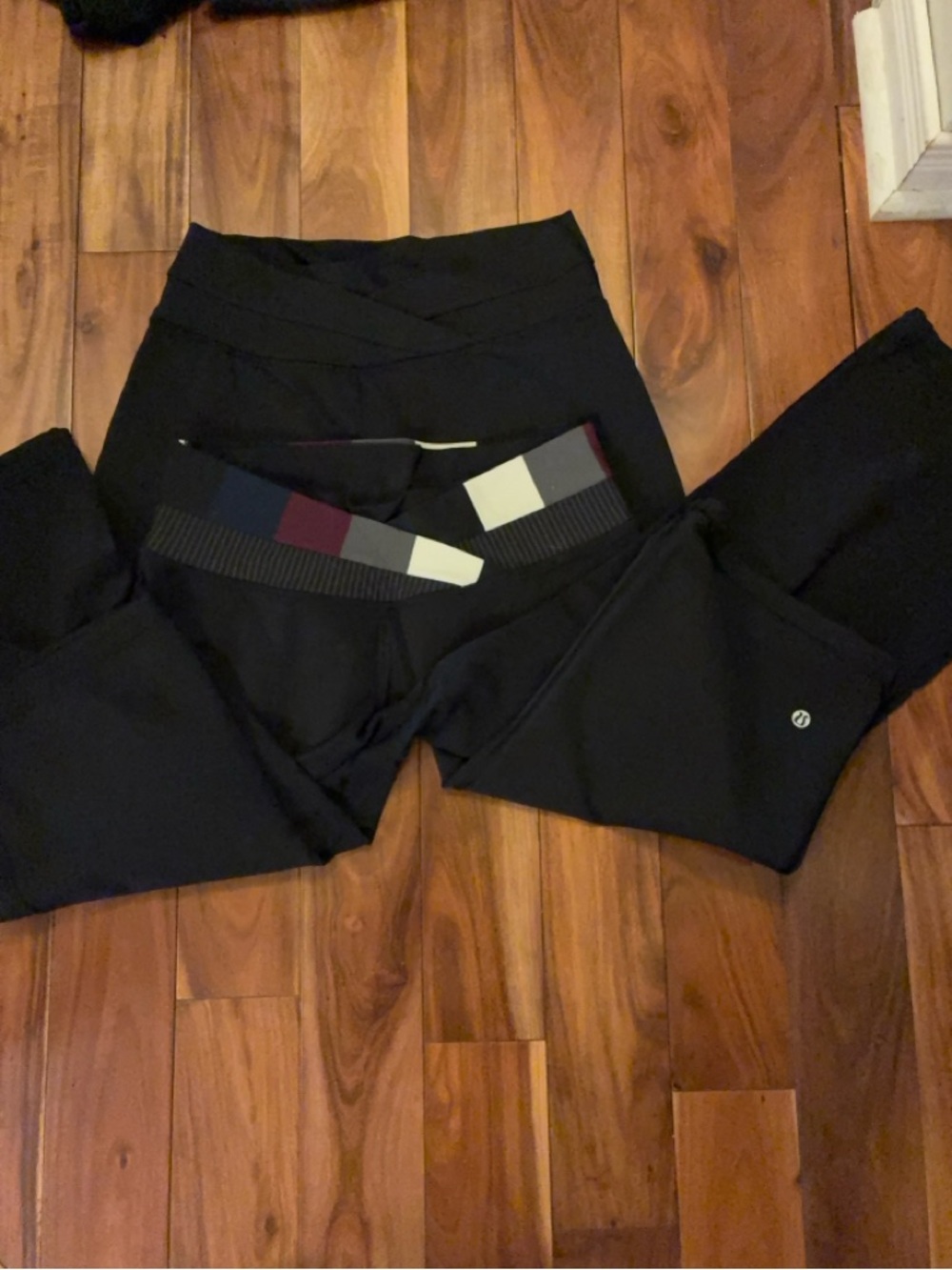 2 Lululemon athletica Black Capris with Multicolor Waistband.